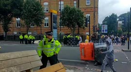 FILE: Police attacked by protesters on Dalston's Kingsland Road