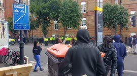 Protesters attack police and journalists told to stop filming