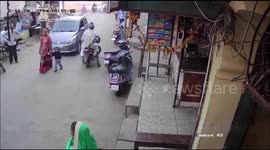Longer Version;Miraculously Escape of child & mother after a speedy car almost ran over them in India