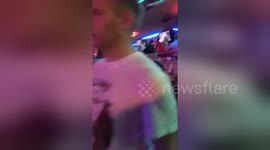Newsflare Edit - 6th June 2015. Benidorm. Bouncer knocks out lad an his girlfriend