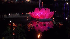 Giant Loikratong float on a canal.