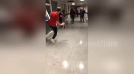 Shocking moment student slide-tackles kissing couple on night out in Wales