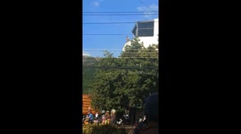 Rescue the drunk tourist jumping off the hotel