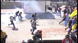 Police fire tear gas at protesting university students in Colombia