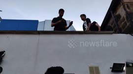 Mo Blogs and Money Kicks on rooftop