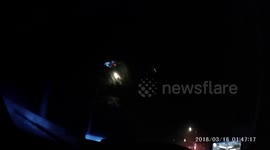 Shocking dashcam captures moment thugs smash police car with sledgehammers