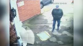 Evil man helped an elderly lady through a heavy door - and PICKPOCKETED her