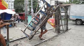 WITHOUT SUBTITLES: Manila 'trolley boys' use hand-made carts to ferry commuters on illegal railway