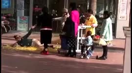 Women toss up piles of fallen leaves for a 'natural photo shoot'