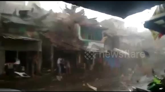 Tornado rips through streets in Indonesia city