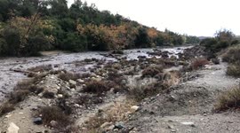 Footage shows fast-moving mud and debris flow as heavy rains strike Holy Fire burn area