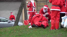 On the naughty list! Santas fight and urinate in public during London’s SantaCon