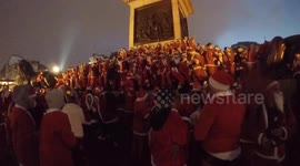 Hundreds of Santas take over London's Trafalgar Square