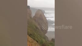 Terrifying footage shows massive cliff collapsing at popular UK beach