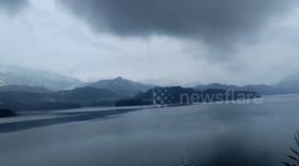 Incredible waterspout spotted over reservoir in southern China