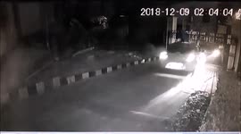 Security guard barely survives being struck by high-speed car at hotel gate