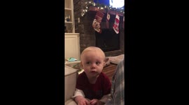 Baby Learns About Christmas Decor