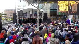 Choir sing at the Suffragette statue unveiling