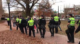 Silent Sam supporters escorted away by police after standoff at UNC-Chapel Hill