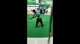 Cobra bites snake charmers hand during show in Thailand