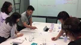 Students solving English puzzle.