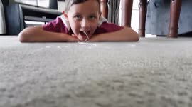 Dad extracts boys' tooth with golf ball and putter