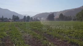 Drone fertilizer in a field with liquid