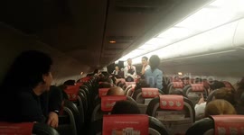 Iberian Airways staff boost passengers moral with complimentary refreshments  after 2hr 50min delay at Birmingham