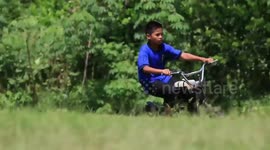 Indonesian 12-year-old builds motorbike using chainsaw to combat deforestation