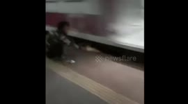 Shocking - Man Gets Stuck Beneath Running Train in Khopol,i Mumbai, Friend Saves Life by Clinging for 20 Seconds