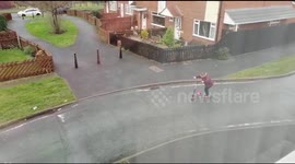 Young lady falling off her scooter on Christmas day