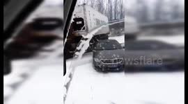 Vehicles collide as snow and ice transform road in eastern Chinese province into bumper car track