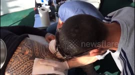 Bodybuilder wraps penis around kitchen ROLLING PIN to have private parts tattooed - completing incredible £7.5k body suit