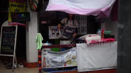 Father transports his kids on modified tricycle