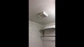 Water from upstairs hotel room into the extractor fun in the room downstairs