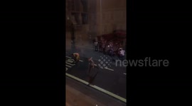 Hilarious! UK students cheer as road painter finishes the last letter of 