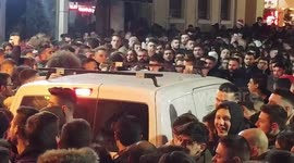 Driver gets his car smashed in attempt to pass through crowd celebrating New Year's Eve