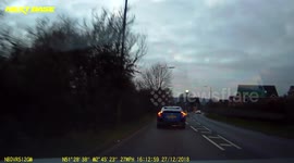 Out of control drone falls from sky - almost crashing into oncoming car