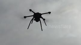 Angry looking drone flying in the sky