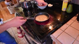 Headless fish moves in pan while being cooked