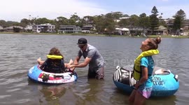 Crafty kids enjoy the Australian summer in their newly built motorised boats