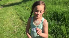 Little girl enjoying the summer sun