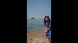 Slow motion​ 960fps​. The girl threw sand beach.