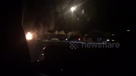 Burning truck next to Papago Freeway.