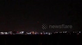 Light flashes over Heathrow Airport as drone sighting stops departures