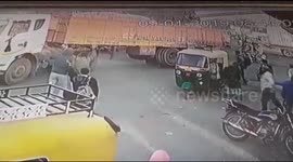 Two riders miraculously survied as truck went over his motorcycle in india