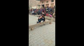 Man pulls a 60 Kilogram wood log with his teeth and shows his performance in Haryana (Part 1)