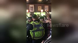 Crowd erupts in victorious cheers after police search fails to unearth flares