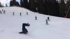 Man hilariously faceplants when attempting ski jump