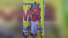 Actor cutout scaffolding collapses as fans climb on top in South India province